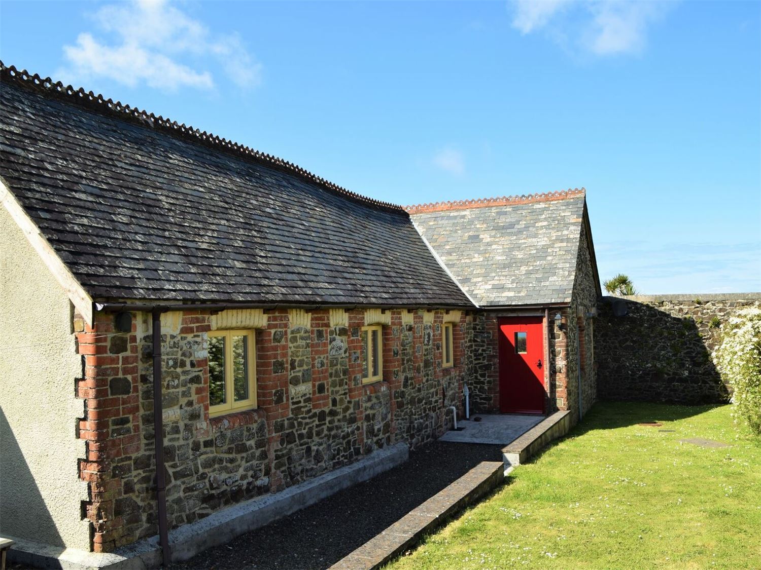 The rear enclosed garden of The Long Barn