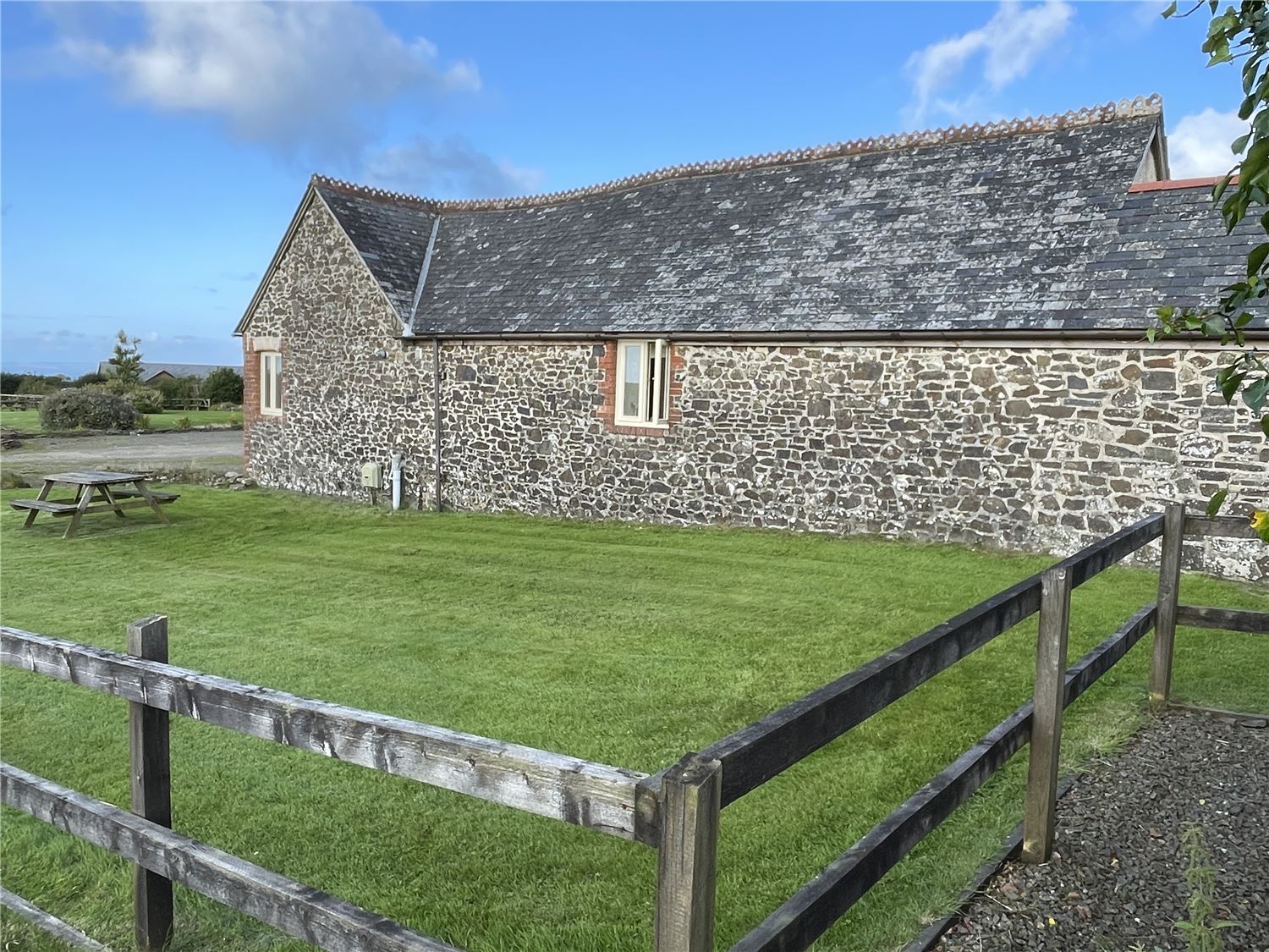 The side view of the garden with a small glimpse of the onward views towards the sea